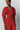 Red textured top with structured sleeves