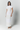Long white embroidered dress with mandarin collar