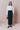 Black textured pencil skirt